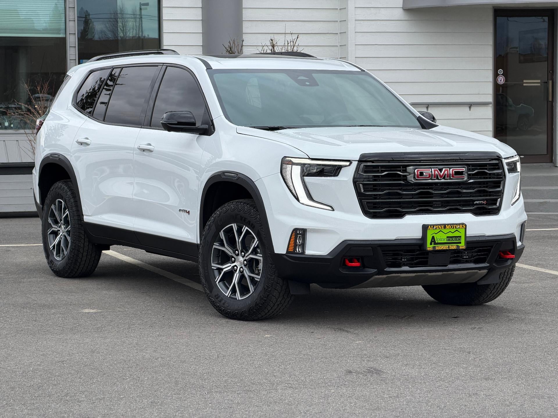 2026 GMC Acadia AWD AT4 in Summit White — front three-quarter view