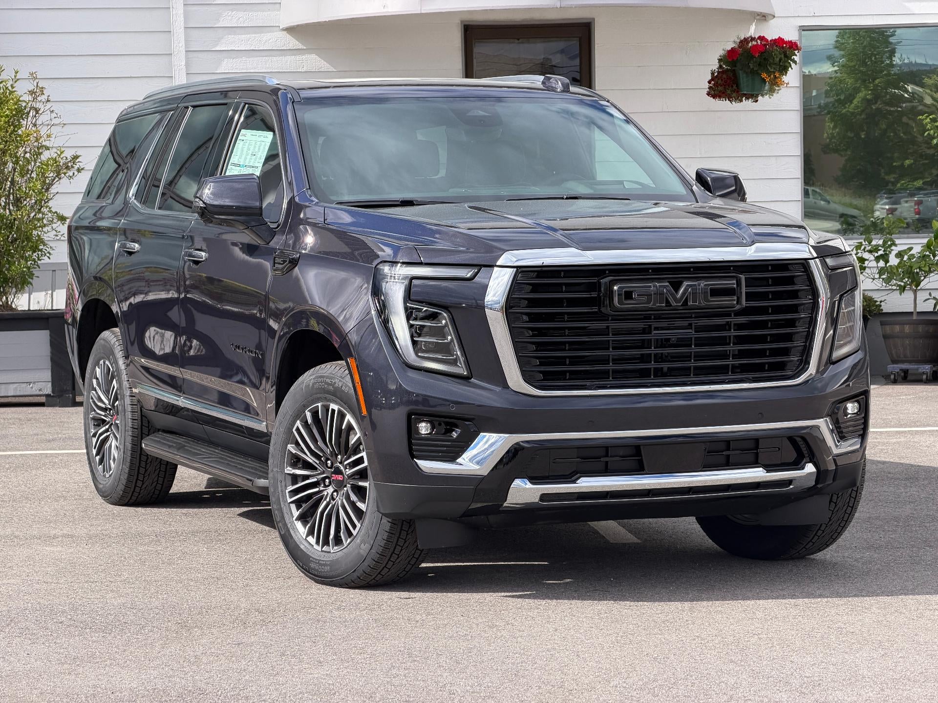 2026 GMC Yukon 4WD 4dr Elevation in Titanium Rush Metallic — front three-quarter view