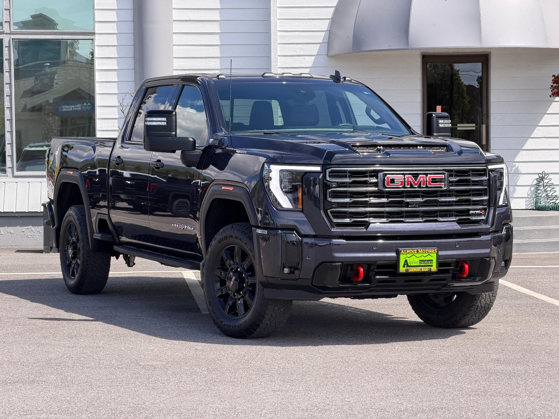 2025 GMC Sierra 2500 HD AT4 /One Owner/ Gas Engine in Titanium Rush Metallic — front three-quarter view