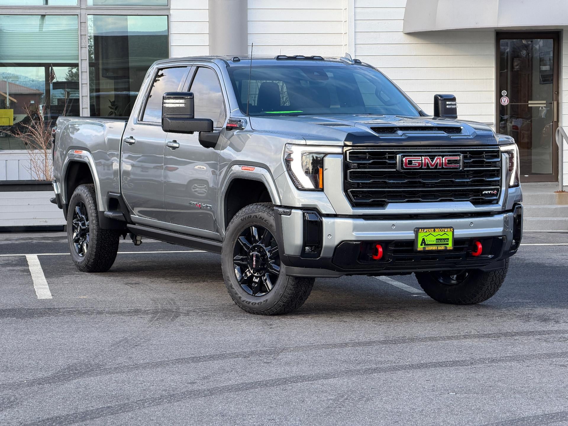 2026 GMC Sierra 2500 HD Crew Cab Standard Box 4-Wheel Drive AT4 in Sterling Metallic — front three-quarter view