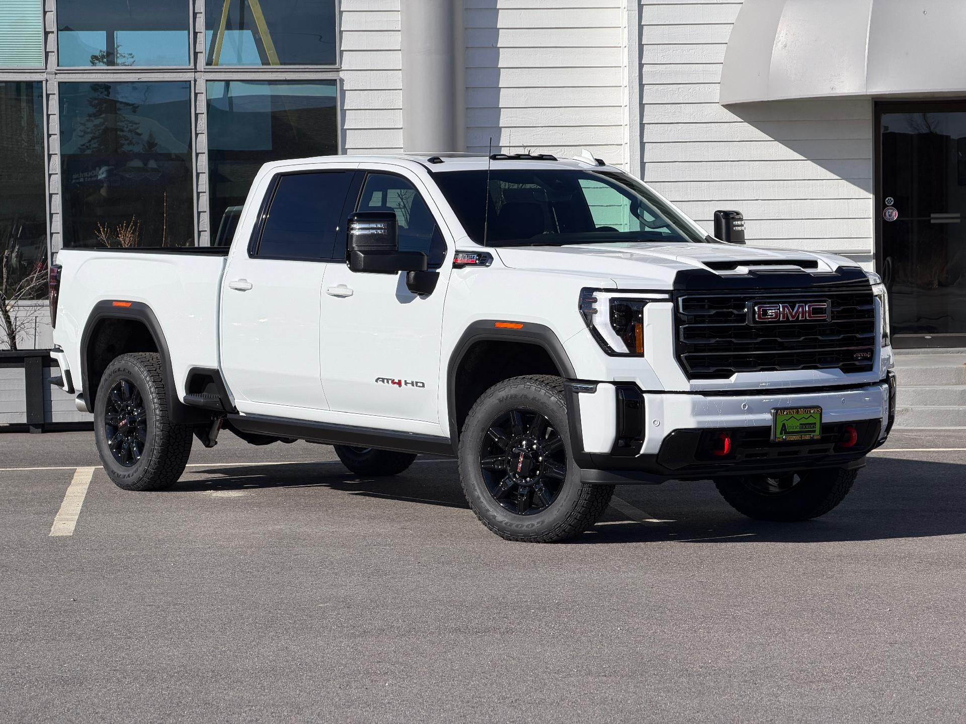 2026 GMC Sierra 3500 HD Crew Cab Standard Box 4-Wheel Drive AT4 in Summit White — front three-quarter view